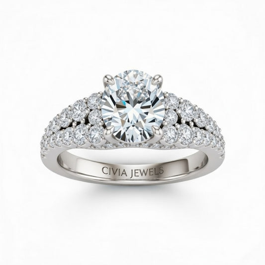 White Gold Oval Cut Solitaire Engagement Ring With Pavé Diamond Band And Classic Four-Prong Setting