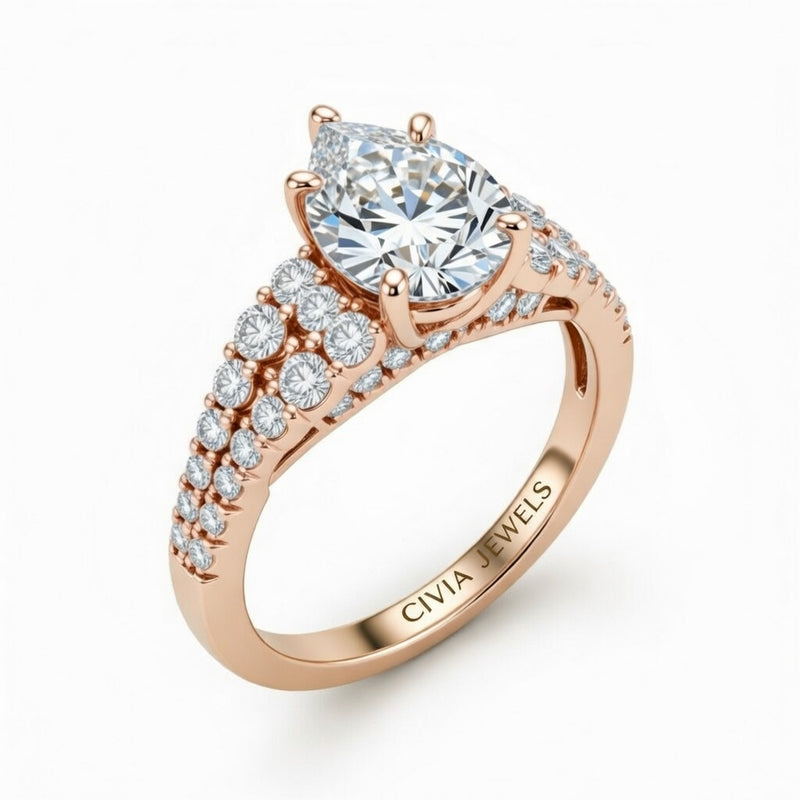 Rose Gold Pear Cut Solitaire Engagement Ring With Pavé Diamond Band And Classic Four-Prong Setting