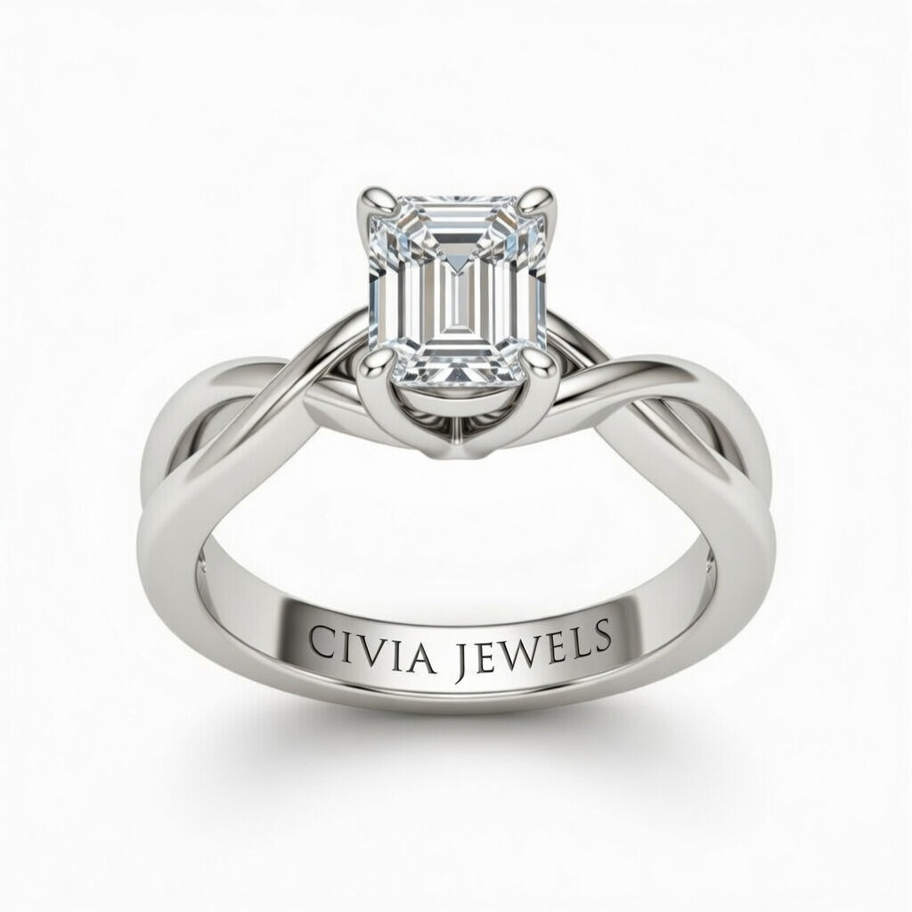 White Gold Emerald Diamond Solitaire Engagement Ring With Interwoven Twist Shank