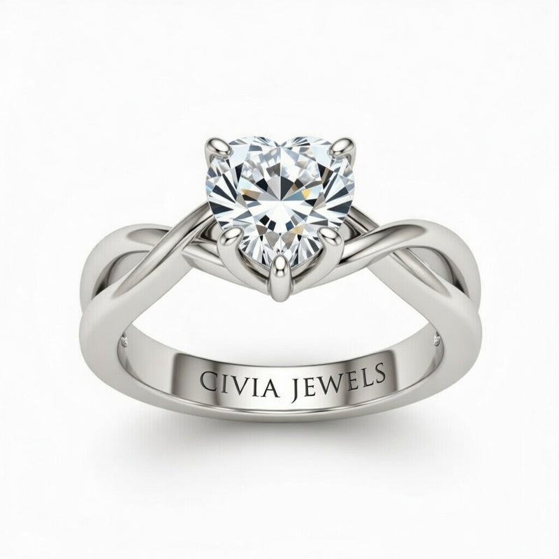 White Gold Heart Diamond Solitaire Engagement Ring With Interwoven Twist Shank