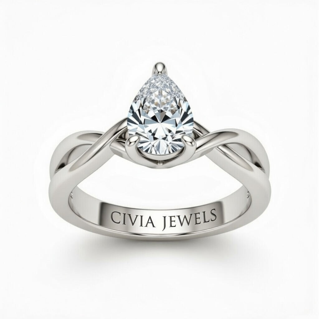 White Gold Pear Diamond Solitaire Engagement Ring With Interwoven Twist Shank