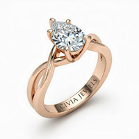 Rose Gold Pear Diamond Solitaire Engagement Ring With Interwoven Twist Shank
