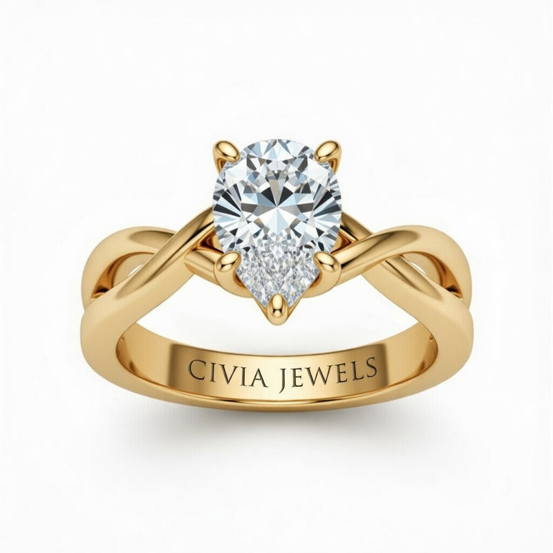 Yellow Gold Pear Diamond Solitaire Engagement Ring With Interwoven Twist Shank
