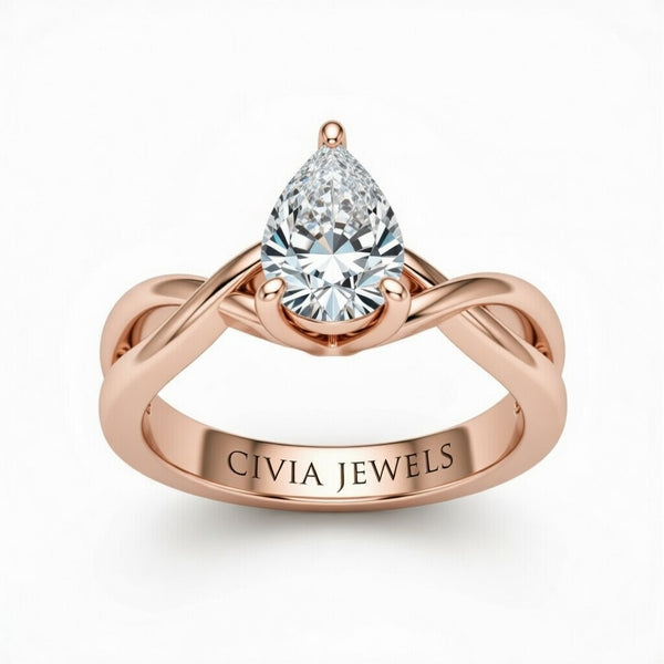 Rose Gold Pear Diamond Solitaire Engagement Ring With Interwoven Twist Shank