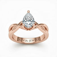 Rose Gold Pear Diamond Solitaire Engagement Ring With Interwoven Twist Shank