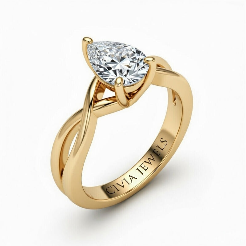 Yellow Gold Pear Diamond Solitaire Engagement Ring With Interwoven Twist Shank