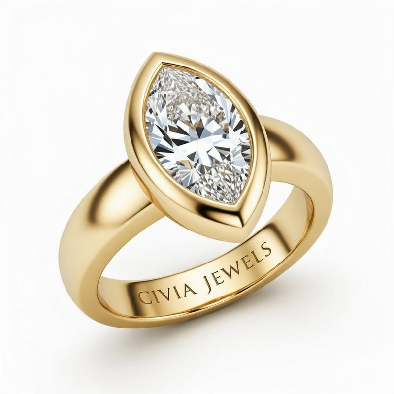 Yellow Gold Marquise Cut Bezel Set Solitaire Engagement Ring