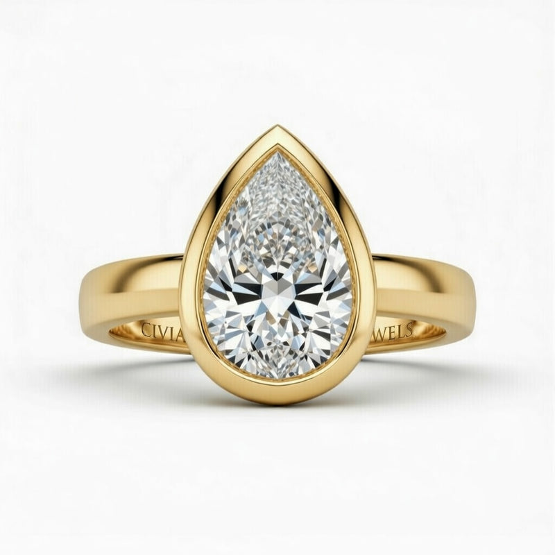 Yellow Gold Pear Cut Bezel Set Solitaire Engagement Ring