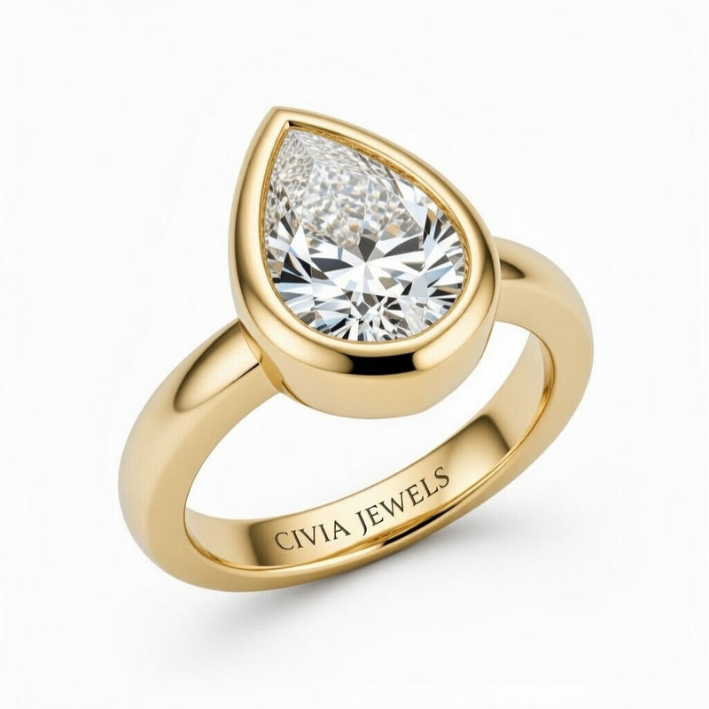 Yellow Gold Pear Cut Bezel Set Solitaire Engagement Ring