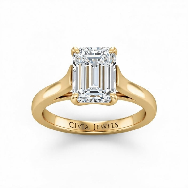Yellow Gold Emerald Cut Solitaire Engagement Ring with Sleek Tapered Shank