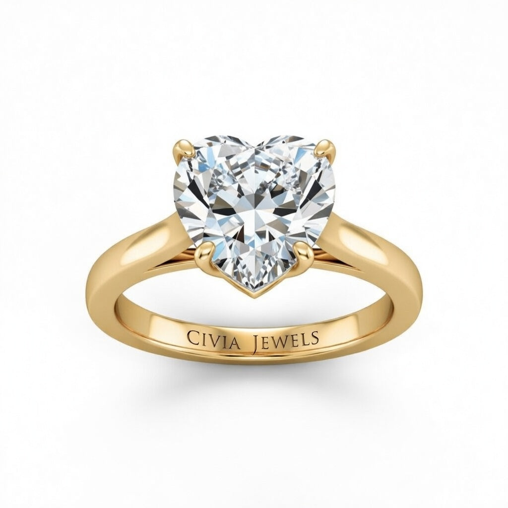 Yellow Gold Heart Cut Solitaire Engagement Ring with Sleek Tapered Shank