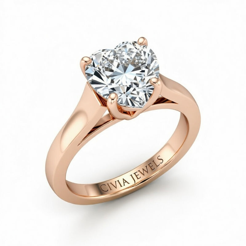Rose Gold Heart Cut Solitaire Engagement Ring with Sleek Tapered Shank