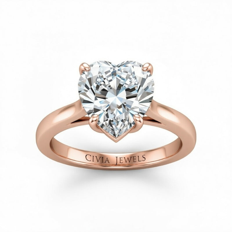 Rose Gold Heart Cut Solitaire Engagement Ring with Sleek Tapered Shank