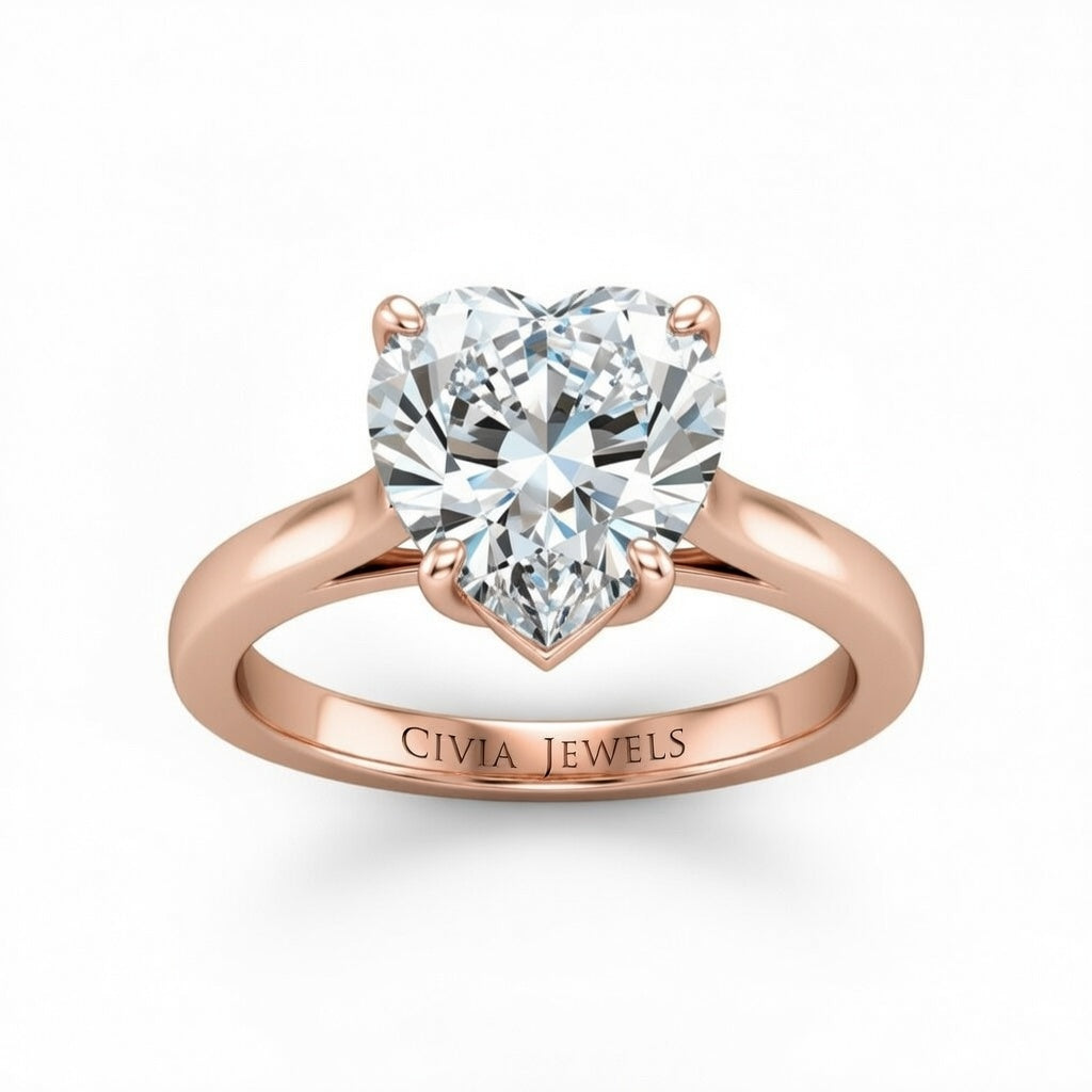 Rose Gold Heart Cut Solitaire Engagement Ring with Sleek Tapered Shank