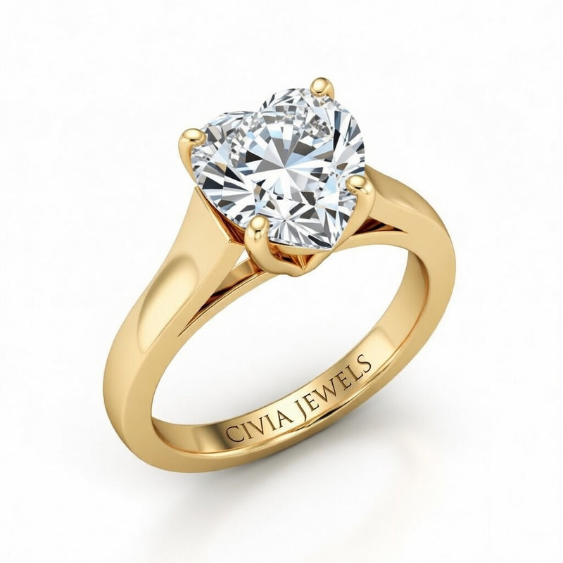 Yellow Gold Heart Cut Solitaire Engagement Ring with Sleek Tapered Shank