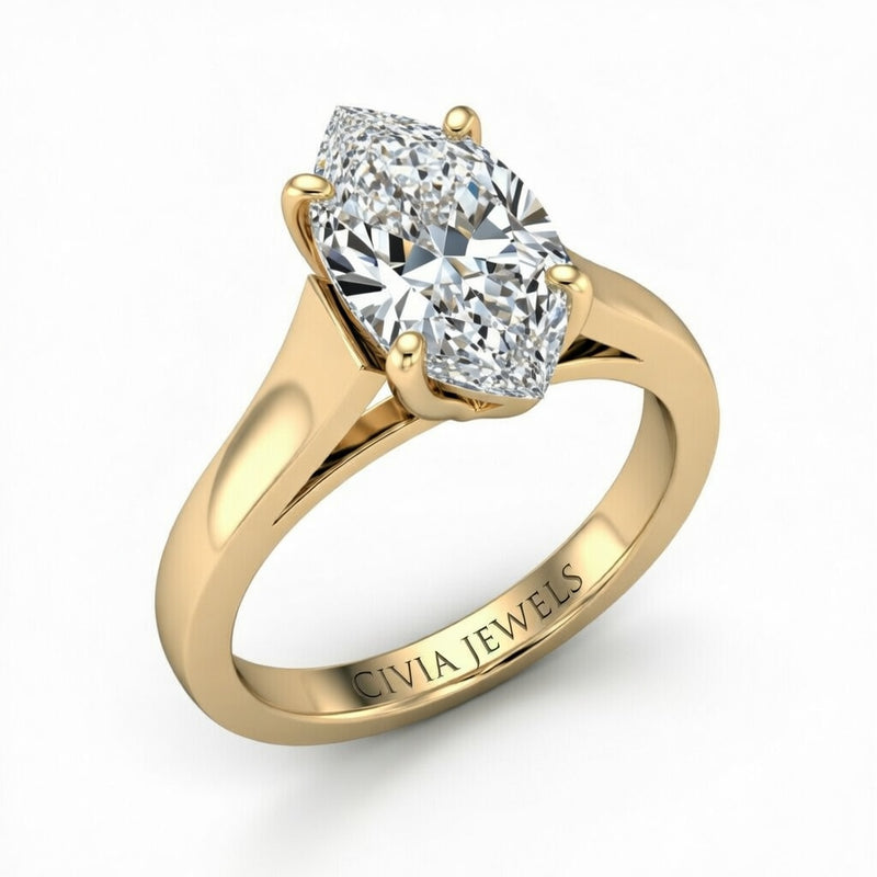Yellow Gold Marquise Cut Solitaire Engagement Ring with Sleek Tapered Shank
