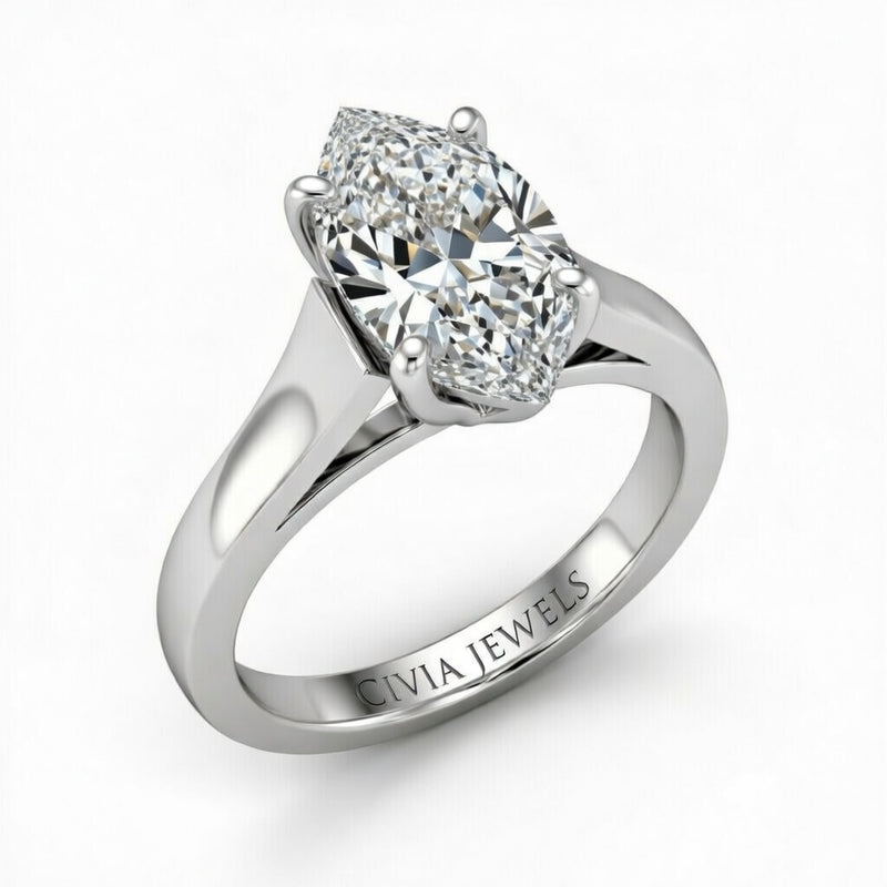 White Gold Marquise Cut Solitaire Engagement Ring with Sleek Tapered Shank