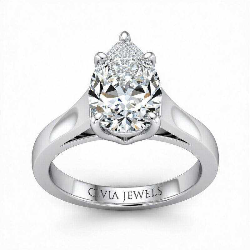 Silver Pear Cut Solitaire Engagement Ring with Sleek Tapered Shank