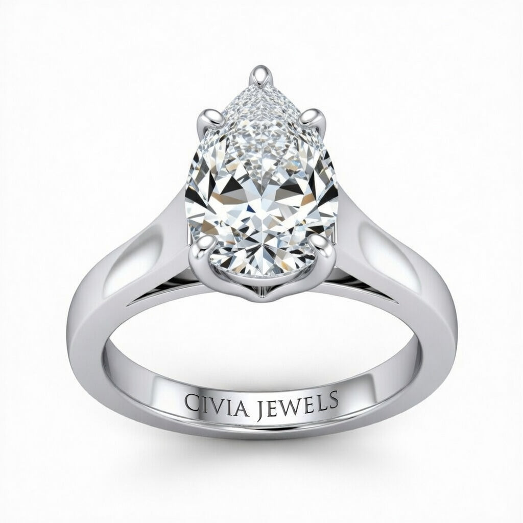 Silver Pear Cut Solitaire Engagement Ring with Sleek Tapered Shank