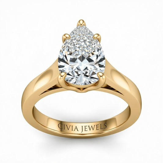 Yellow Gold Pear Cut Solitaire Engagement Ring with Sleek Tapered Shank