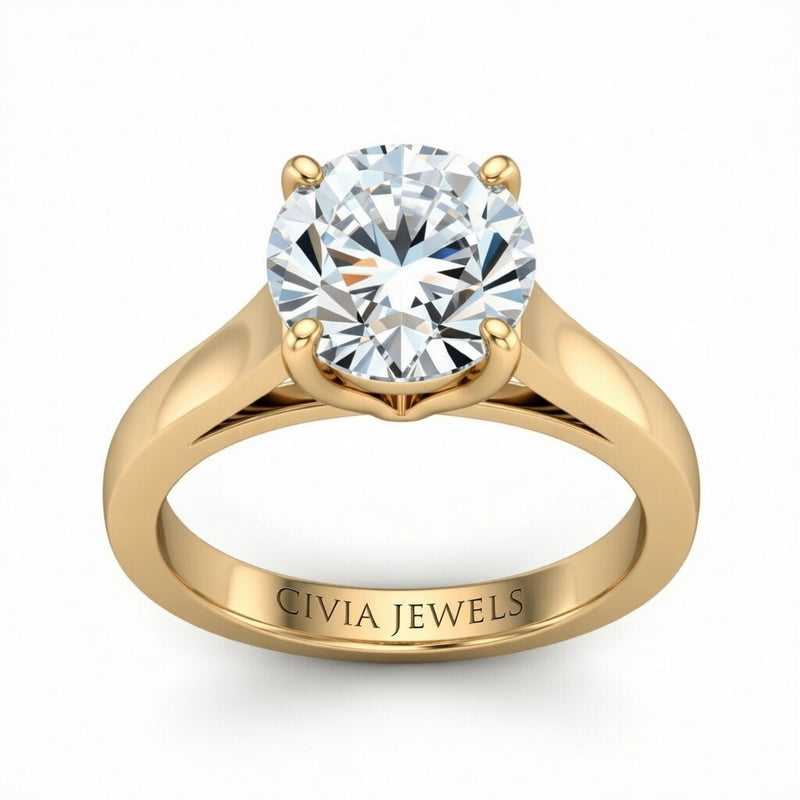 Yellow Gold Round Cut Solitaire Engagement Ring with Sleek Tapered Shank