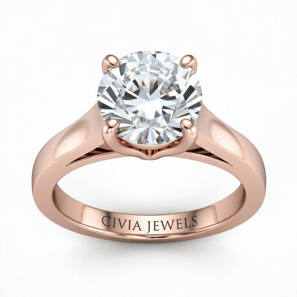 Rose Gold Round Cut Solitaire Engagement Ring with Sleek Tapered Shank