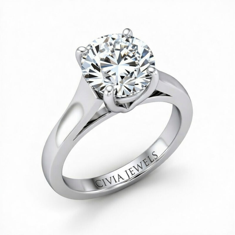 Silver Round Cut Solitaire Engagement Ring with Sleek Tapered Shank