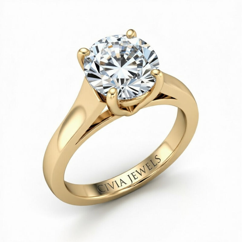 Yellow Gold Round Cut Solitaire Engagement Ring with Sleek Tapered Shank