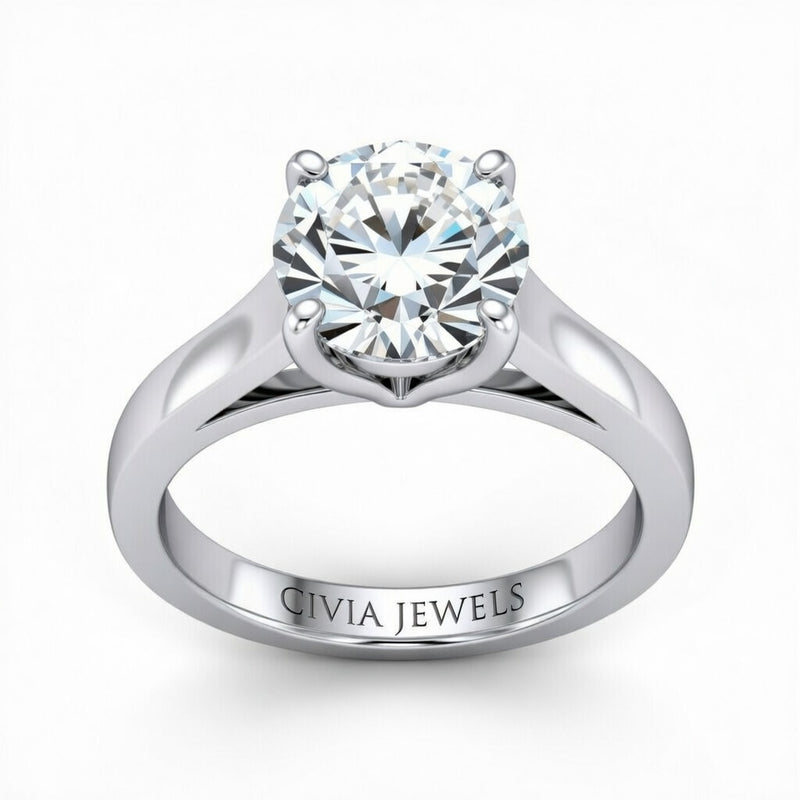 White Gold Round Cut Solitaire Engagement Ring with Sleek Tapered Shank