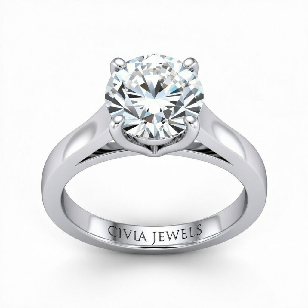 White Gold Round Cut Solitaire Engagement Ring with Sleek Tapered Shank