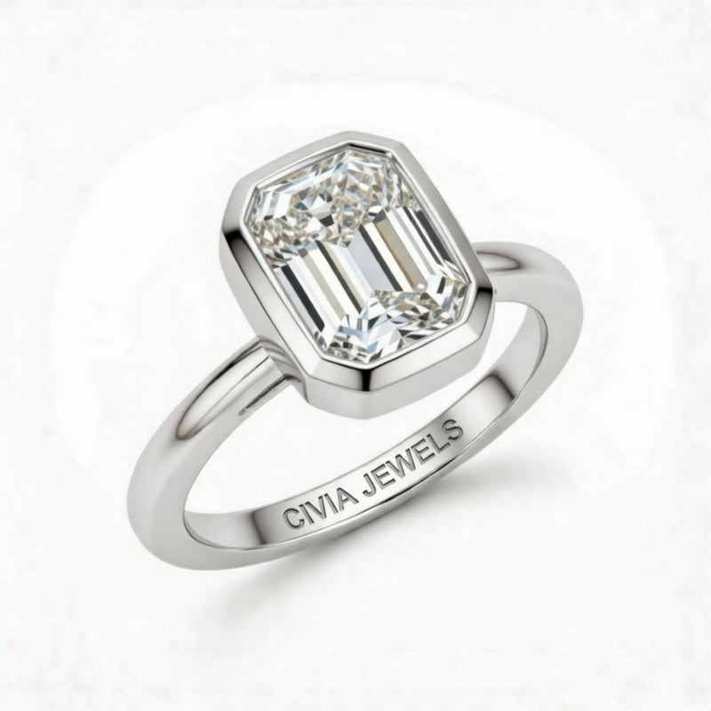 White Gold Emerald Cut Bezel Set Solitaire Engagement Ring with Polished Comfort Fit Band