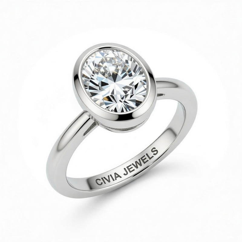 White Gold Oval Cut Bezel Set Solitaire Engagement Ring with Polished Comfort Fit Band