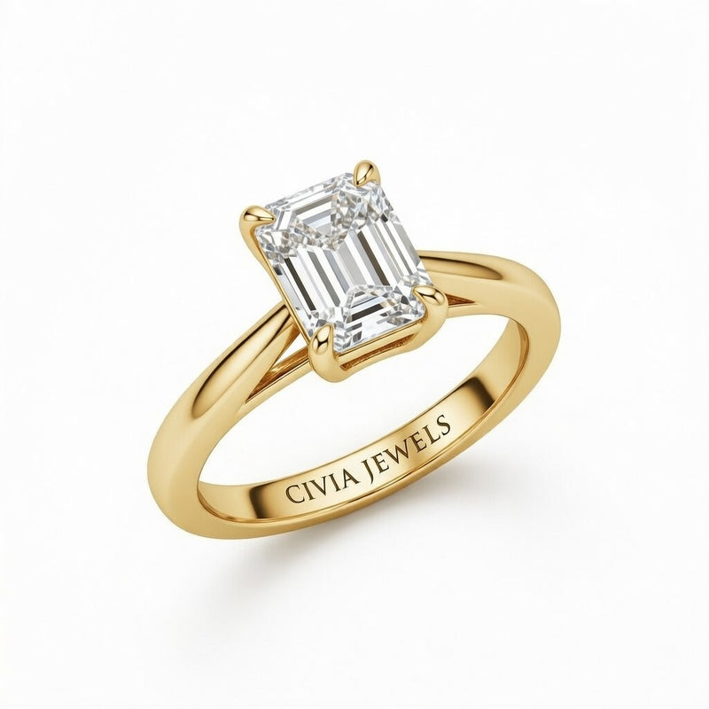 Yellow Gold Emerald Cut Solitaire Engagement Ring with Sculpted Tapered Shank