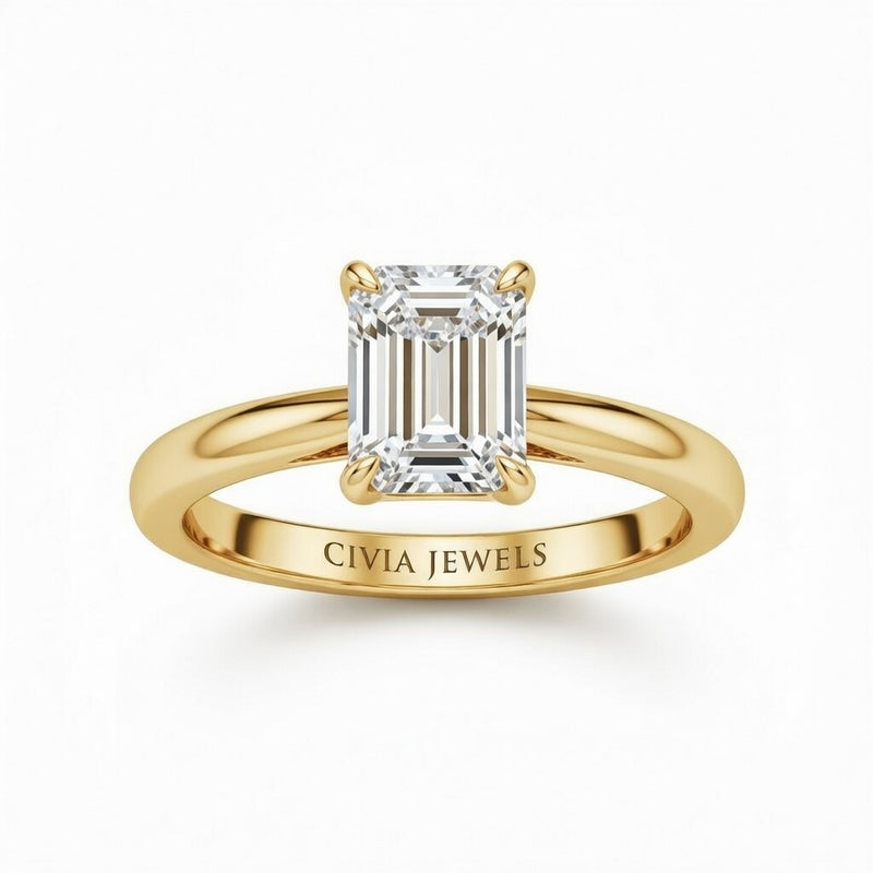 Yellow Gold Emerald Cut Solitaire Engagement Ring with Sculpted Tapered Shank