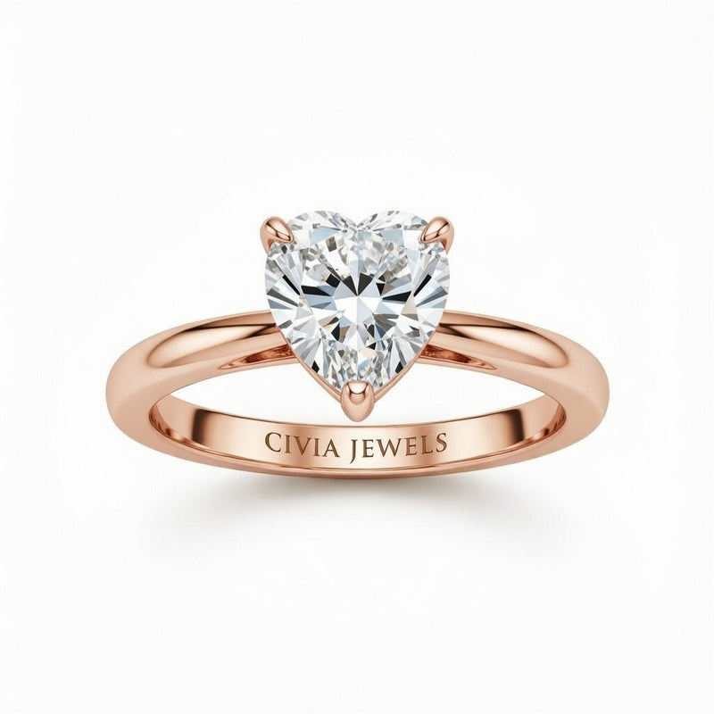 Rose Gold Heart Cut Solitaire Engagement Ring with Sculpted Tapered Shank