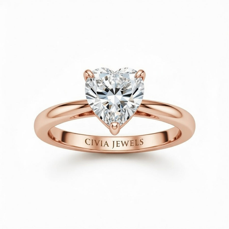 Rose Gold Heart Cut Solitaire Engagement Ring with Sculpted Tapered Shank