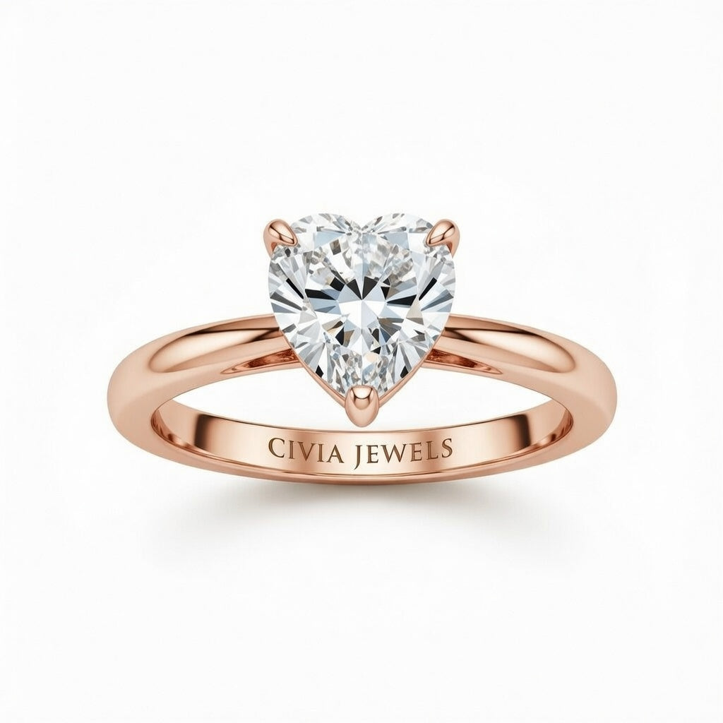 Rose Gold Heart Cut Solitaire Engagement Ring with Sculpted Tapered Shank