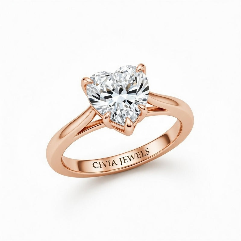 Rose Gold Heart Cut Solitaire Engagement Ring with Sculpted Tapered Shank