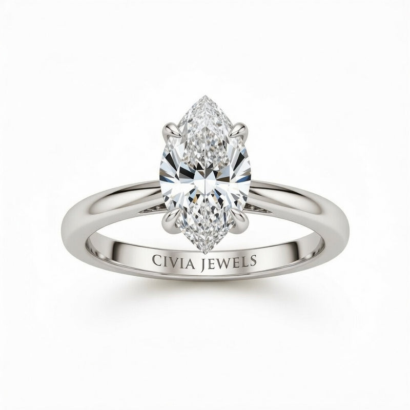 White Gold Marquise Cut Solitaire Engagement Ring with Sculpted Tapered Shank