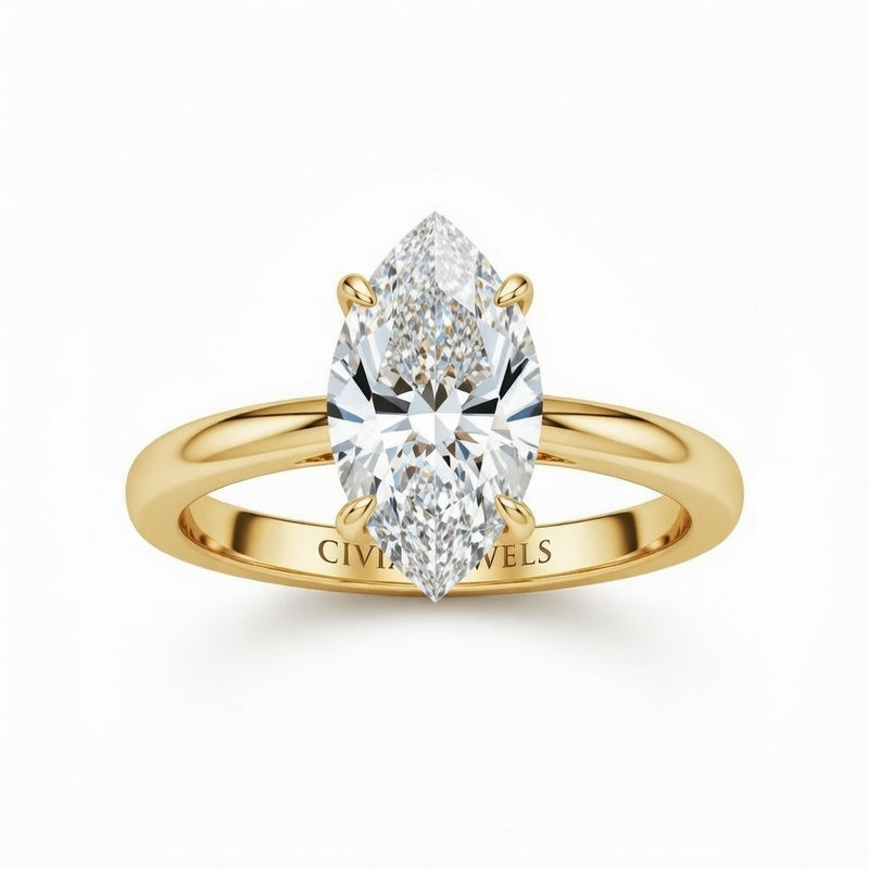 Yellow Gold Marquise Cut Solitaire Engagement Ring with Sculpted Tapered Shank