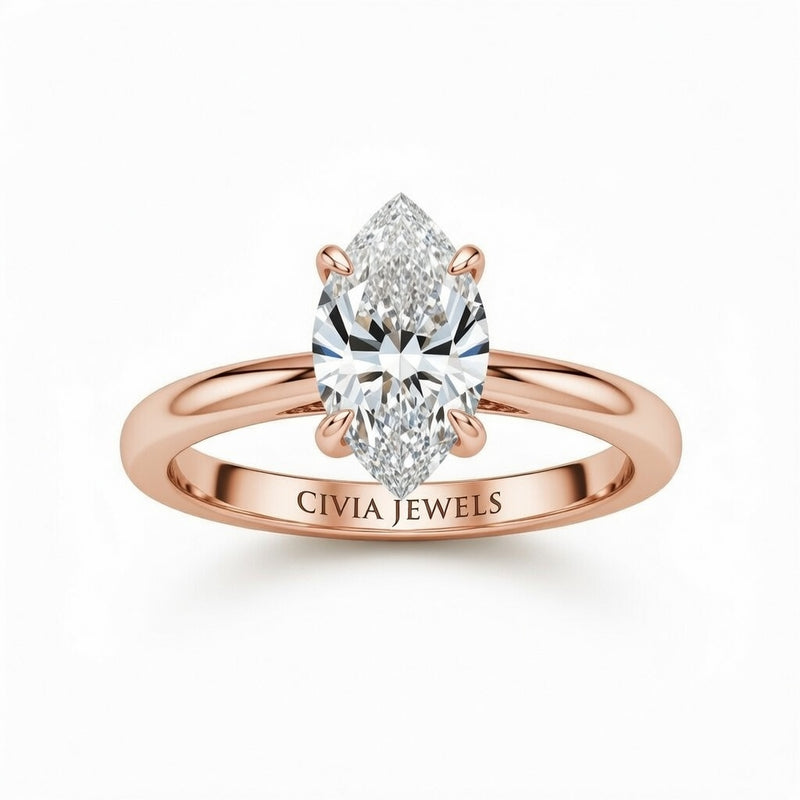 Rose Gold Marquise Cut Solitaire Engagement Ring with Sculpted Tapered Shank