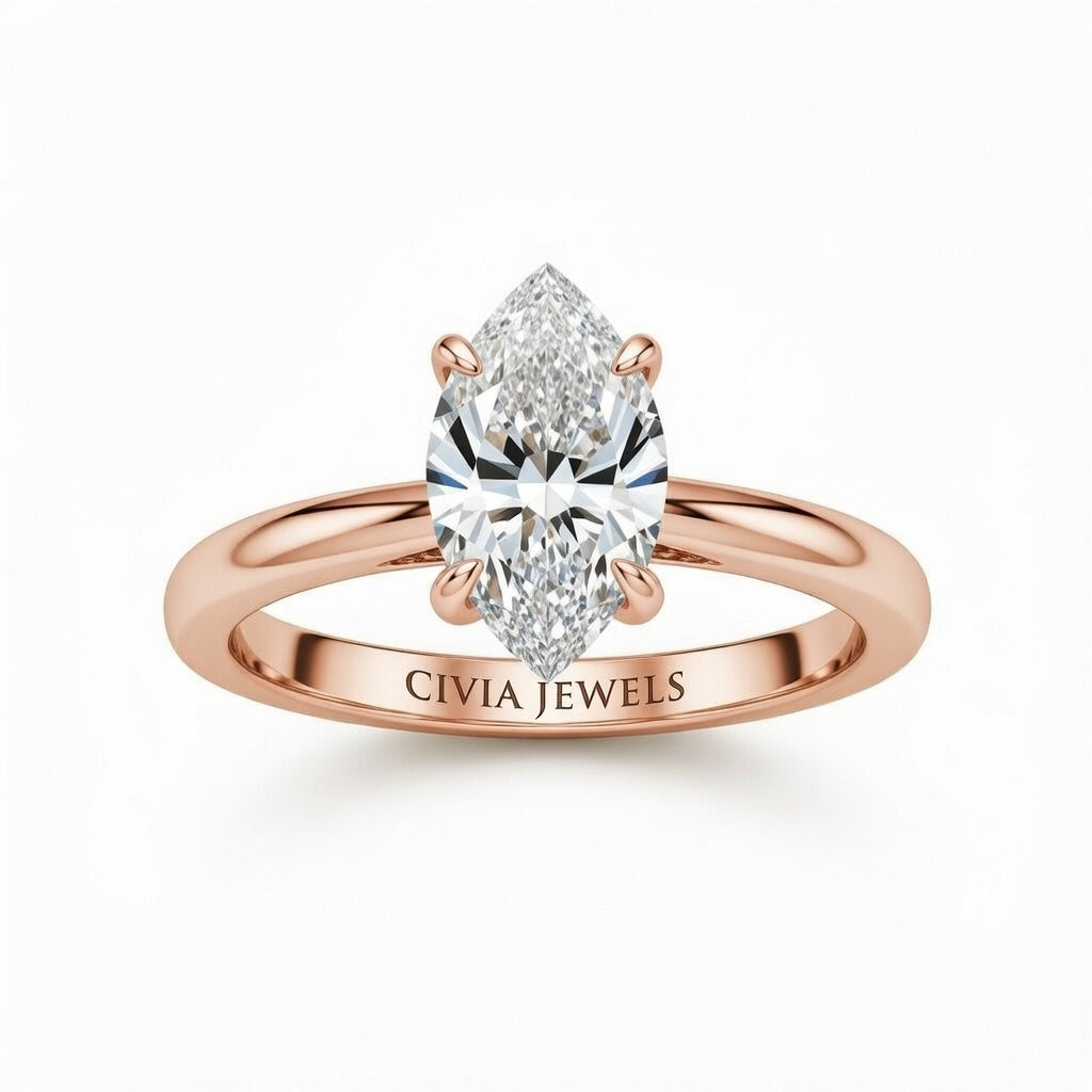 Rose Gold Marquise Cut Solitaire Engagement Ring with Sculpted Tapered Shank