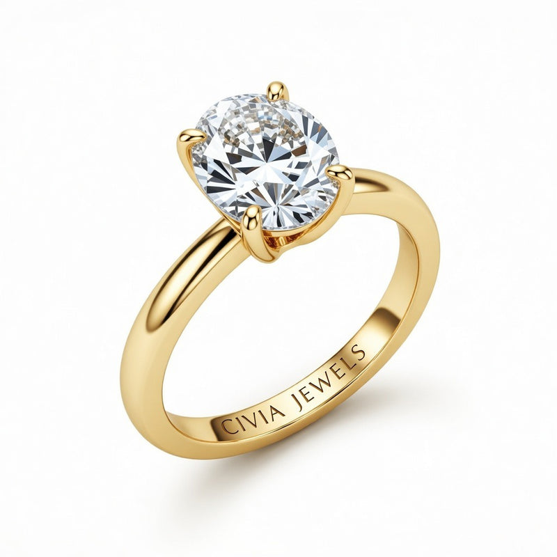 Yellow Gold Oval Cut Solitaire Engagement Ring with Sculpted Tapered Shank