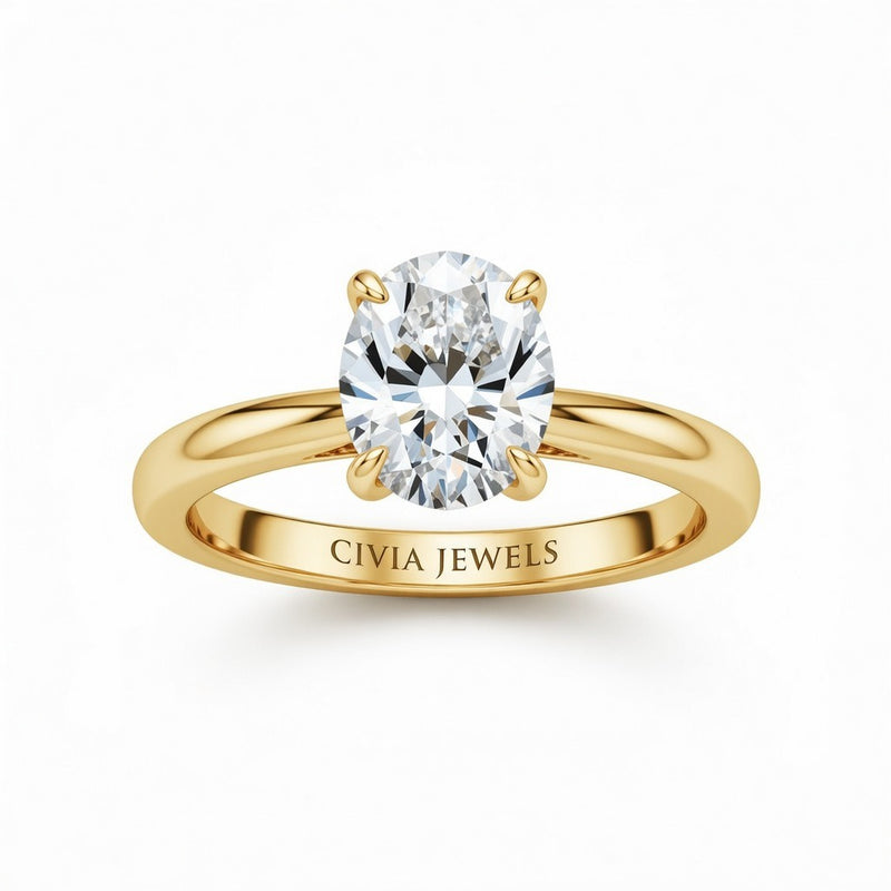 Yellow Gold Oval Cut Solitaire Engagement Ring with Sculpted Tapered Shank