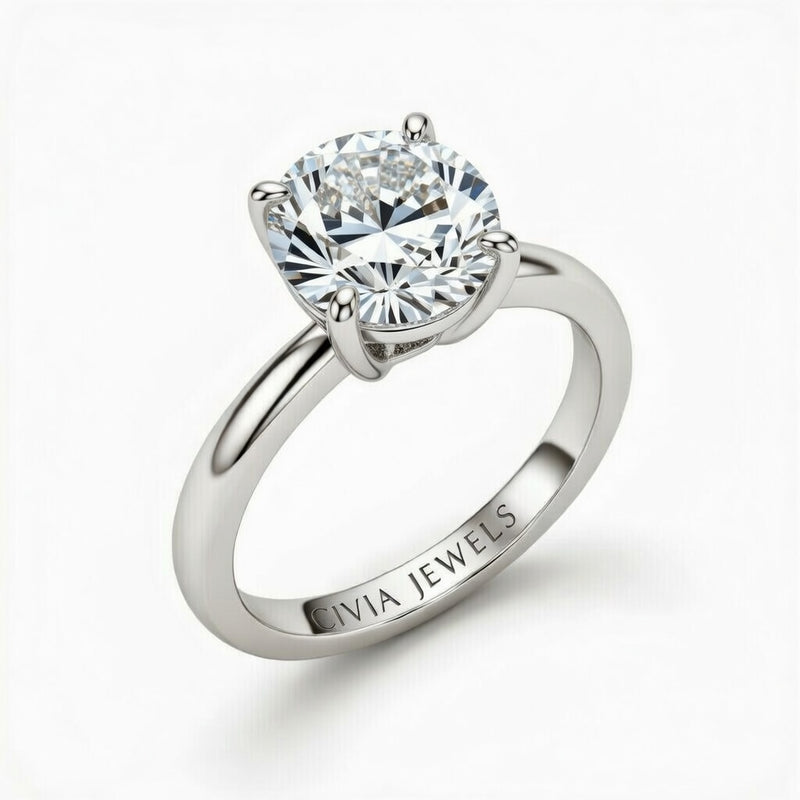 Silver Round Cut Solitaire Engagement Ring with Sculpted Tapered Shank
