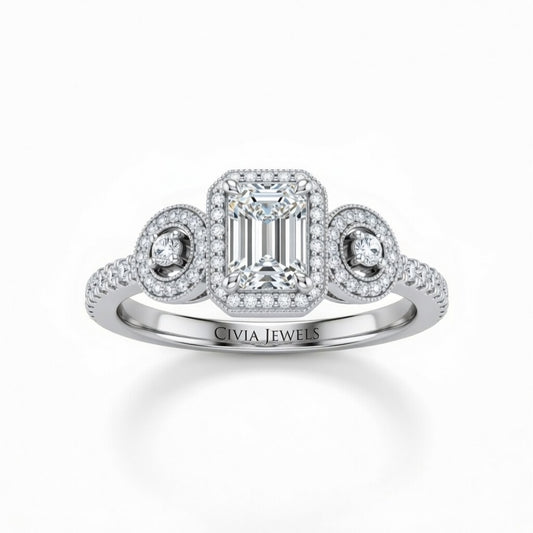 White Gold Emerald Brilliant Three Stone Halo Engagement Ring With Vintage Milgrain Detail