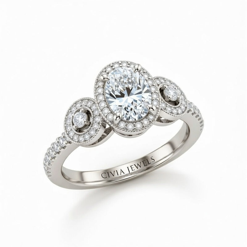 Silver Oval Brilliant Three Stone Halo Engagement Ring With Vintage Milgrain Detail