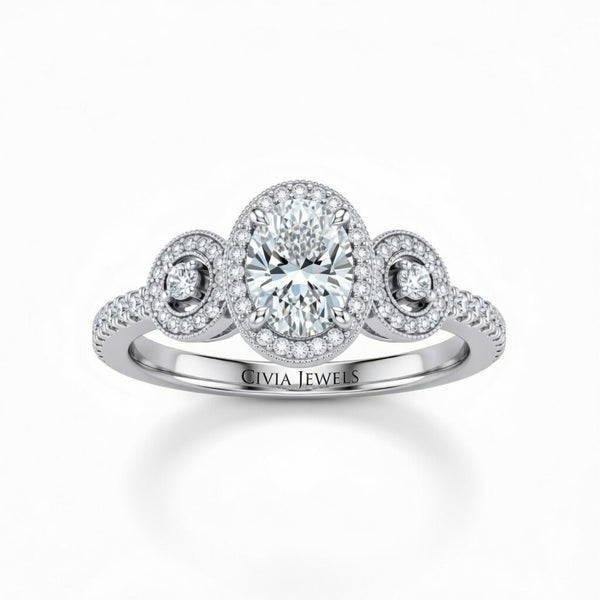 White Gold Oval Brilliant Three Stone Halo Engagement Ring With Vintage Milgrain Detail