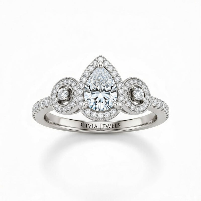 White Gold Pear Brilliant Three Stone Halo Engagement Ring With Vintage Milgrain Detail