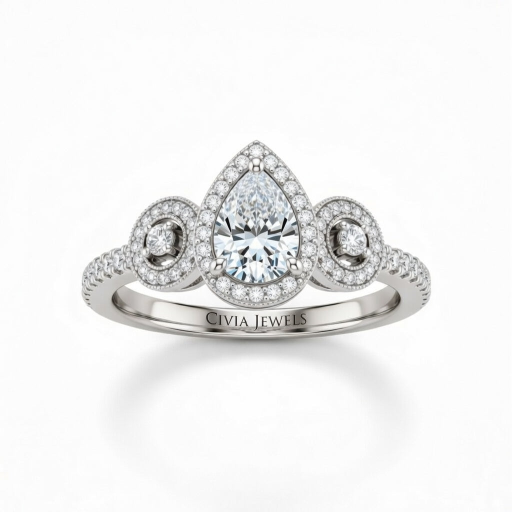 White Gold Pear Brilliant Three Stone Halo Engagement Ring With Vintage Milgrain Detail